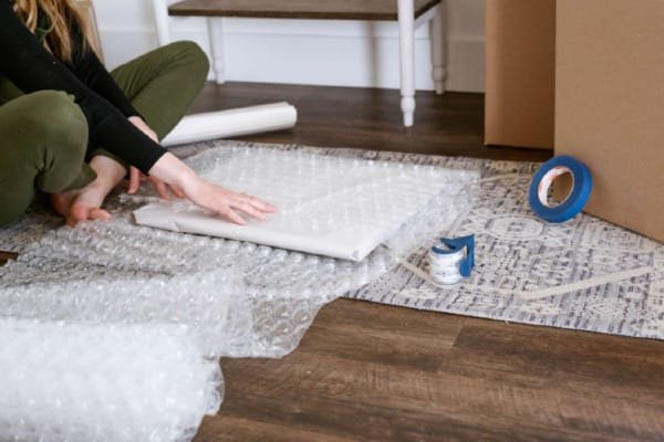 Safely Handling a Painting by the Frame