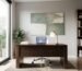 Modern home office featuring a large textured acoustic painting for improved acoustics and professional zoom background.