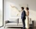 Homeowners using an acoustic art buying guide to choose decorative sound panels.
