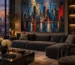 Large textured abstract cityscape painting in a modern minimalist living room.